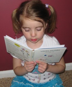 Child reading intently