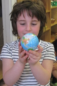 The world is in your hands. Young Masters Little Wisdom Discovery Program